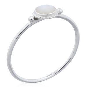 A mother of pearl round silver bordered round ring