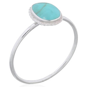 A synthetic turquoise ovate sterling silver ring