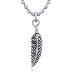 A oxidized silver tribal feather pendant