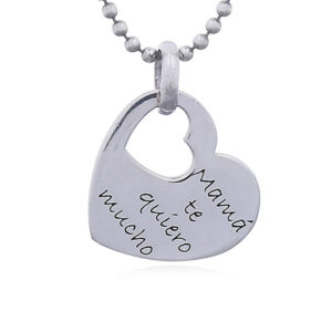 A silver heart tag pendant mama te quiero mucho