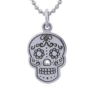 A larger sugar skull silver pendant perforated nose