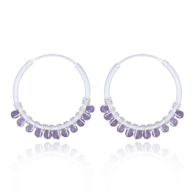 A pair of sterling silver amethyst hoop earrings