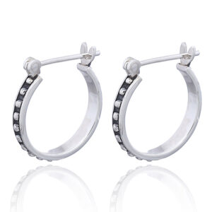 A pair of bohemian oxidized silver beaded hoop earrings