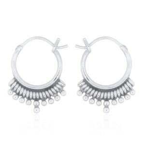 A pair of tribal beads in bohemian mini hoop earrings