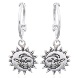 A pair of crescent sun and moon sterling silver huggie hoop earrings