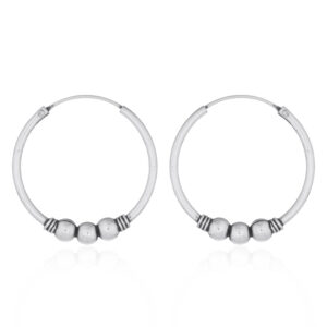A pair of triple balls twenty five mm 925 silver bali hoop earrings