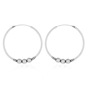 A pair of triple balls thirty eight mm 925 silver bali hoop earrings