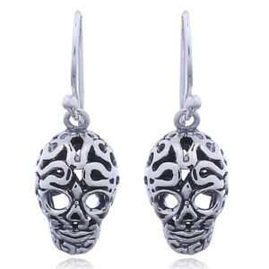 A pair of antiqued perforated skull 925 silver dangle earrings