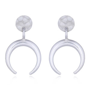 A pair of crescent moon sterling silver disc stud earrings