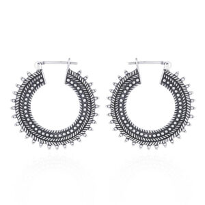 A pair of antique hoop silver earrings in floral beads