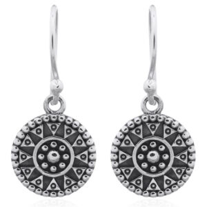 A pair of medallion tribal dangle sterling silver earrings