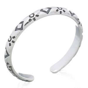 A sun and diamond surrounded silver toe ring