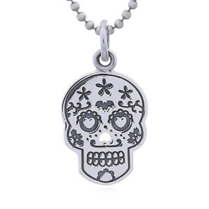 A larger love-struck sugar skull silver pendant
