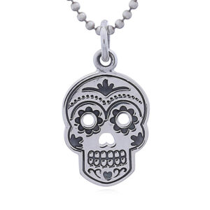 A larger sugar skull silver pendant unibrow