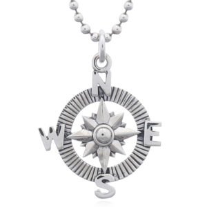 A sterling silver compass pendant