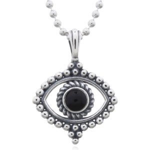 A extraordinary figured evil eye black stone silver pendant