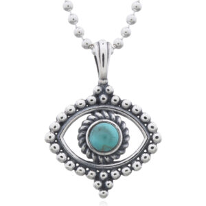 A extraordinary figured evil eye green stone silver pendant