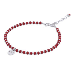 A red glass & silver bead bracelet with silver infinity charm