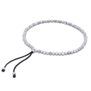 An adjustable polyester sterling silver beaded bracelet