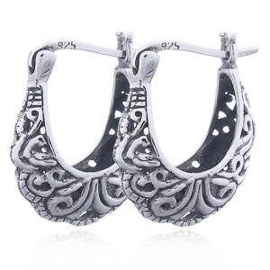 A pair of planet silver designer hoops ajoure silver crescent shape