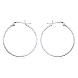 A pair of sparkling faceted surface on circle silver hoop earrings