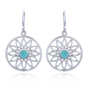 A pair of round silver flower earrings with howlite turquoise