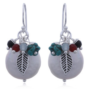 A pair of bejeweled silver and off round pearl earrings