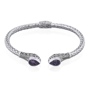 A tear drop amethyst stone on bohemian hinged silver bangle