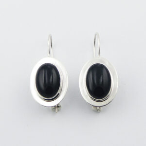 A pair of black agate oval polished flange surround earrings