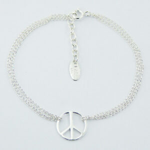A double sterling silver curb chain bracelet with peace symbol charm