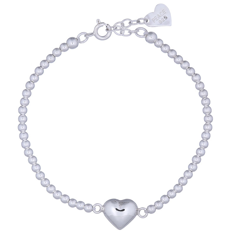 A polished sterling silver puffed heart charm bracelet
