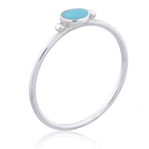 A round synthetic turquoise on 925 silver ring