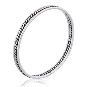 A oxidized twist in silver line stackable ring