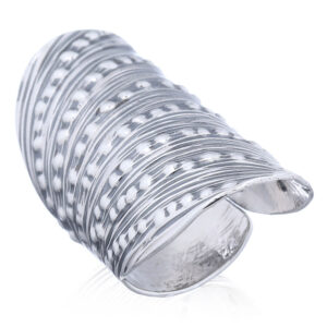 An adjustable curly shell oxidized silver ring
