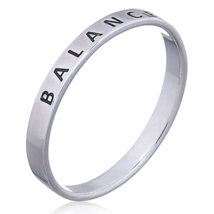 A balance sterling silver band ring