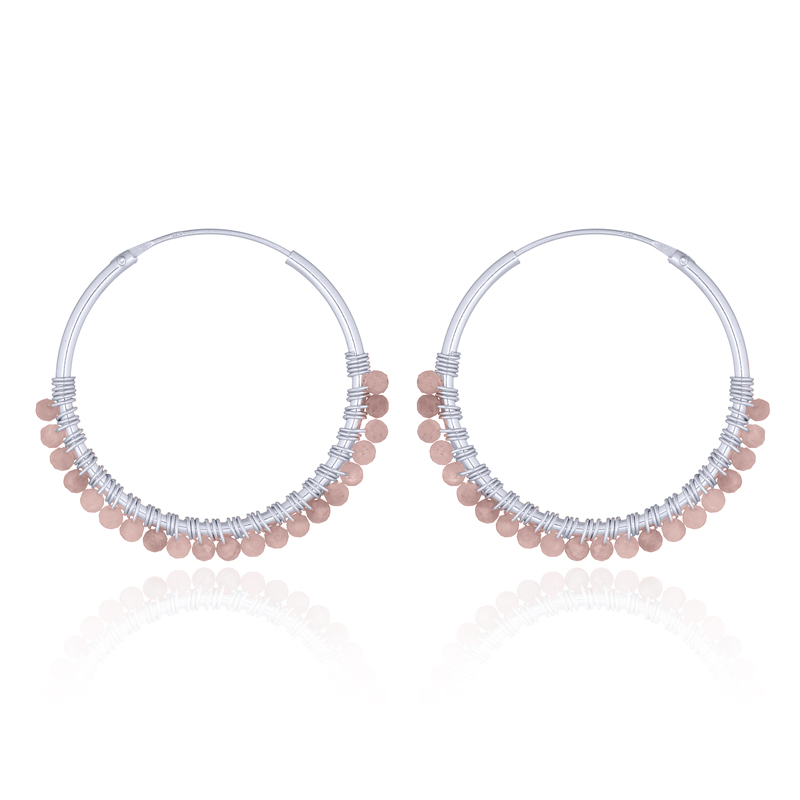 A pair of pink rhodonite stone sterling silver hoop earrings