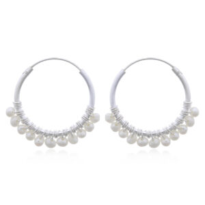 A pair of sterling silver beaded freshwater pearl hoop earrings