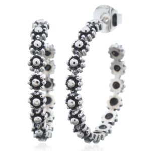 A pair of ornate flower antiqued 925 silver stud earrings