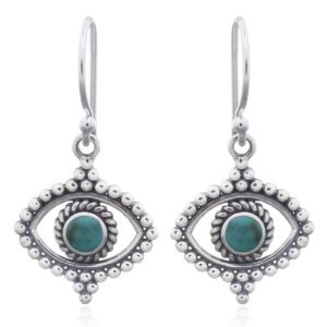 A pair of extraordinary evil eye synthetic green stone silver dangle earrings