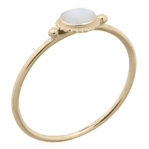 A mother of pearl round silver bordered gold plated ring