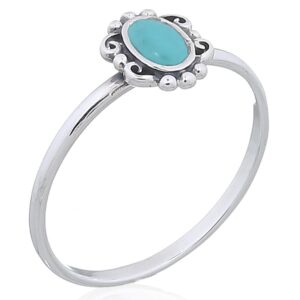 An antiqued 925 silver ring synthetic turquoise