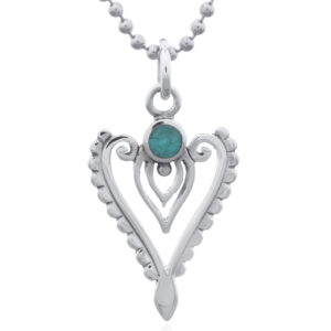 A intricate heart green synthetic stone sterling silver pendant