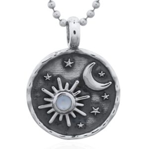 A sun, moon and star sterling silver mother of pearl pendant