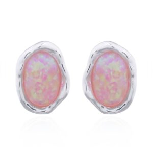 A pair of pink oval opal on organic shape setting silver stud earrings