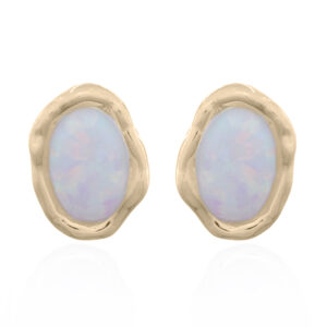 A pair of 925 silver oval opal on organic shape setting gold plated stud earrings