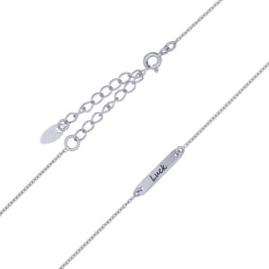 A silver chain necklace with "luck" disc plate