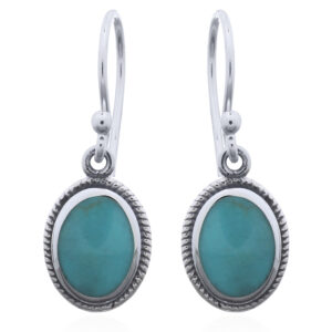 A pair of 925 sterling silver oval green stone dangle earrings