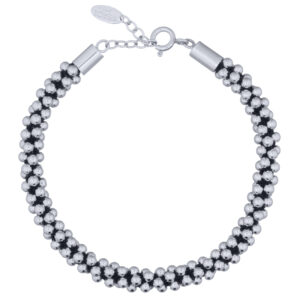 A handcrafted macrame bracelet covered with silver beads