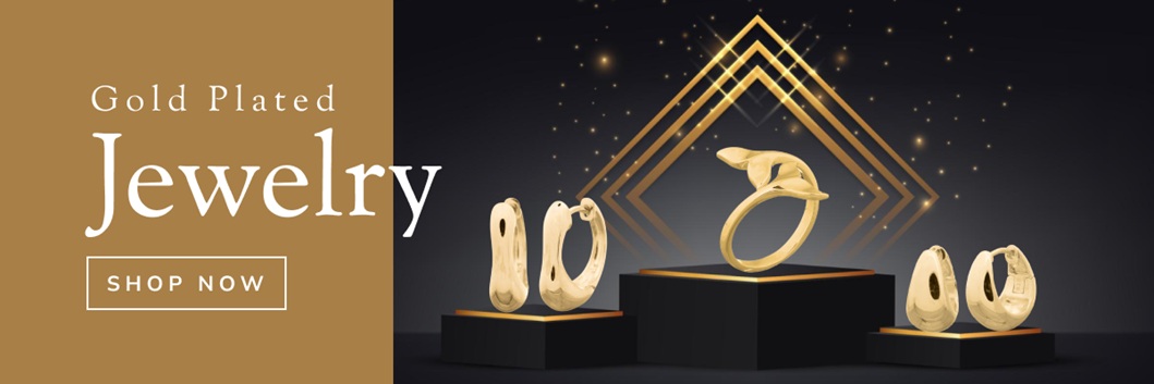 Rectangular banner with the with text, Gold Plated Jewelry. Three pedestals to the right of it, showcasing two pairs or earrings and a ring in gold plating.